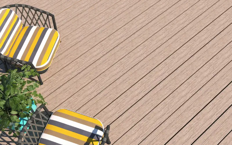 Outdoor chairs on a composite deck in the sun